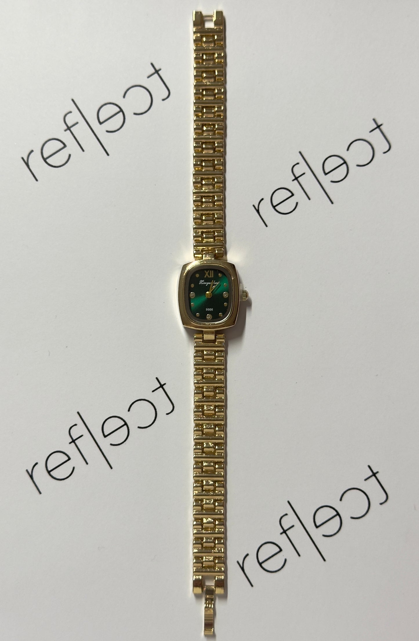 Gina gold-emerald
