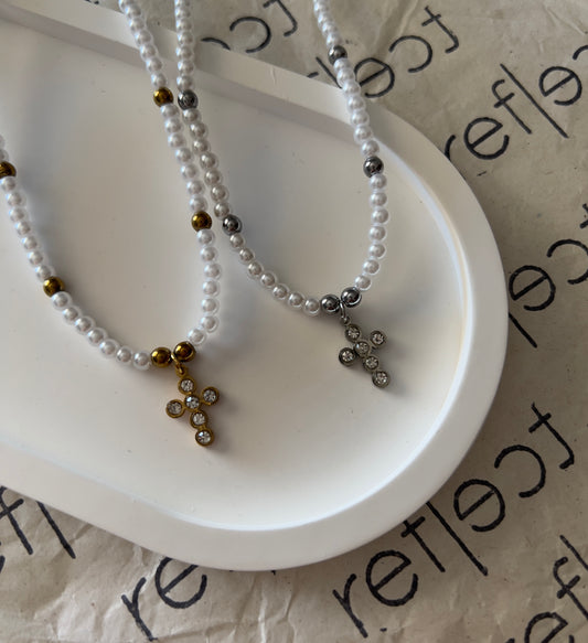 Pearl necklace with little cross