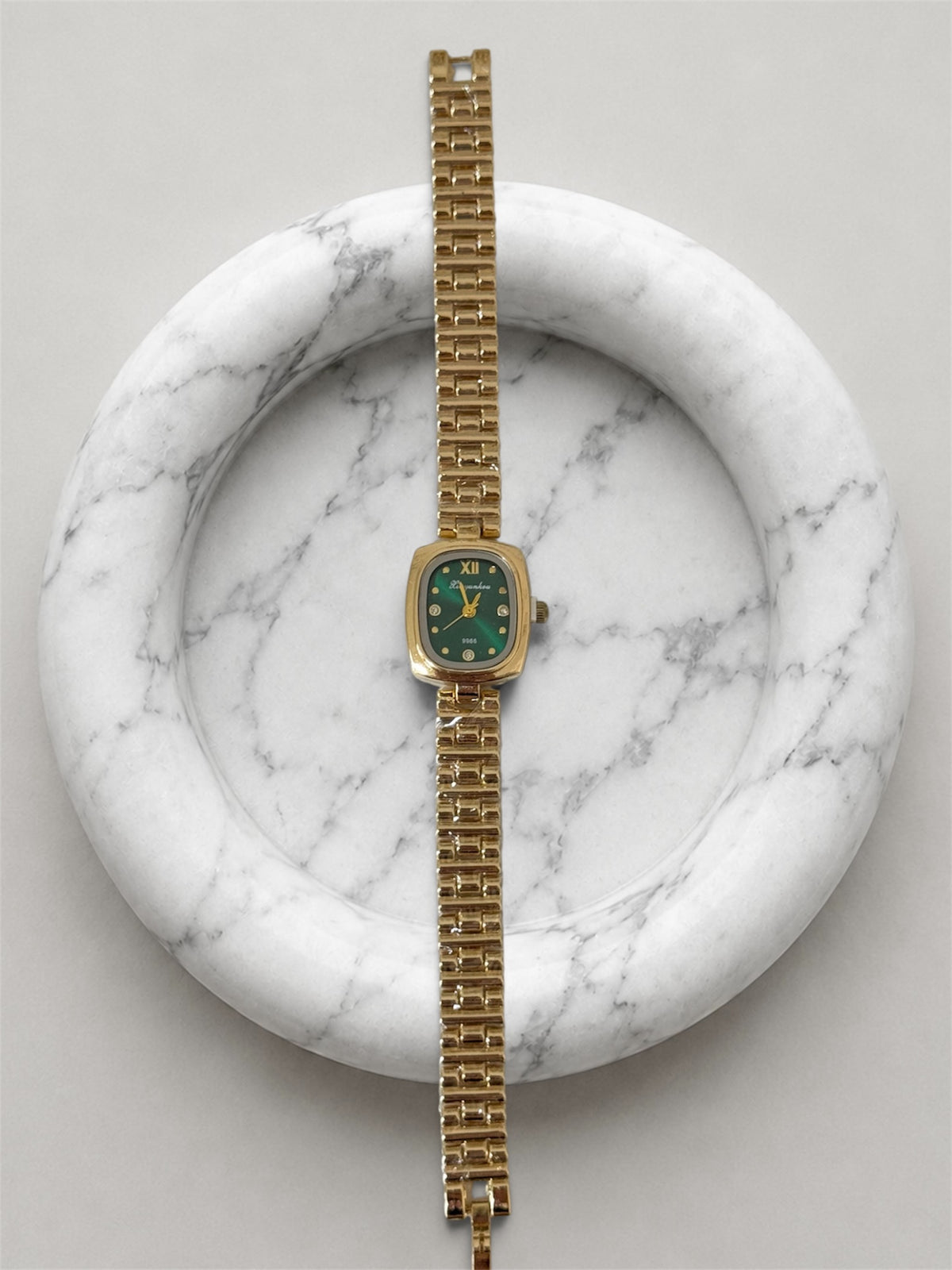 Gina gold-emerald