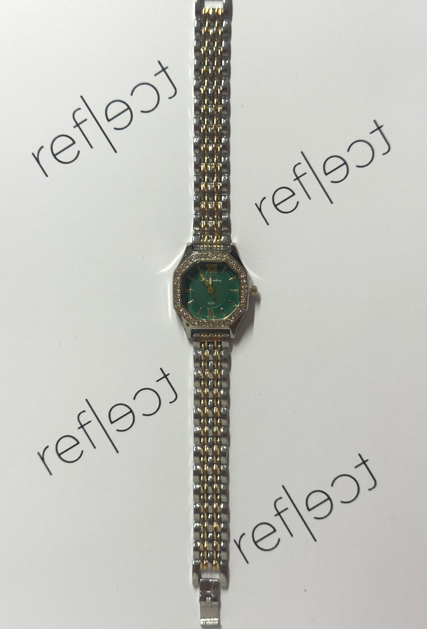 Monica mixed-emerald