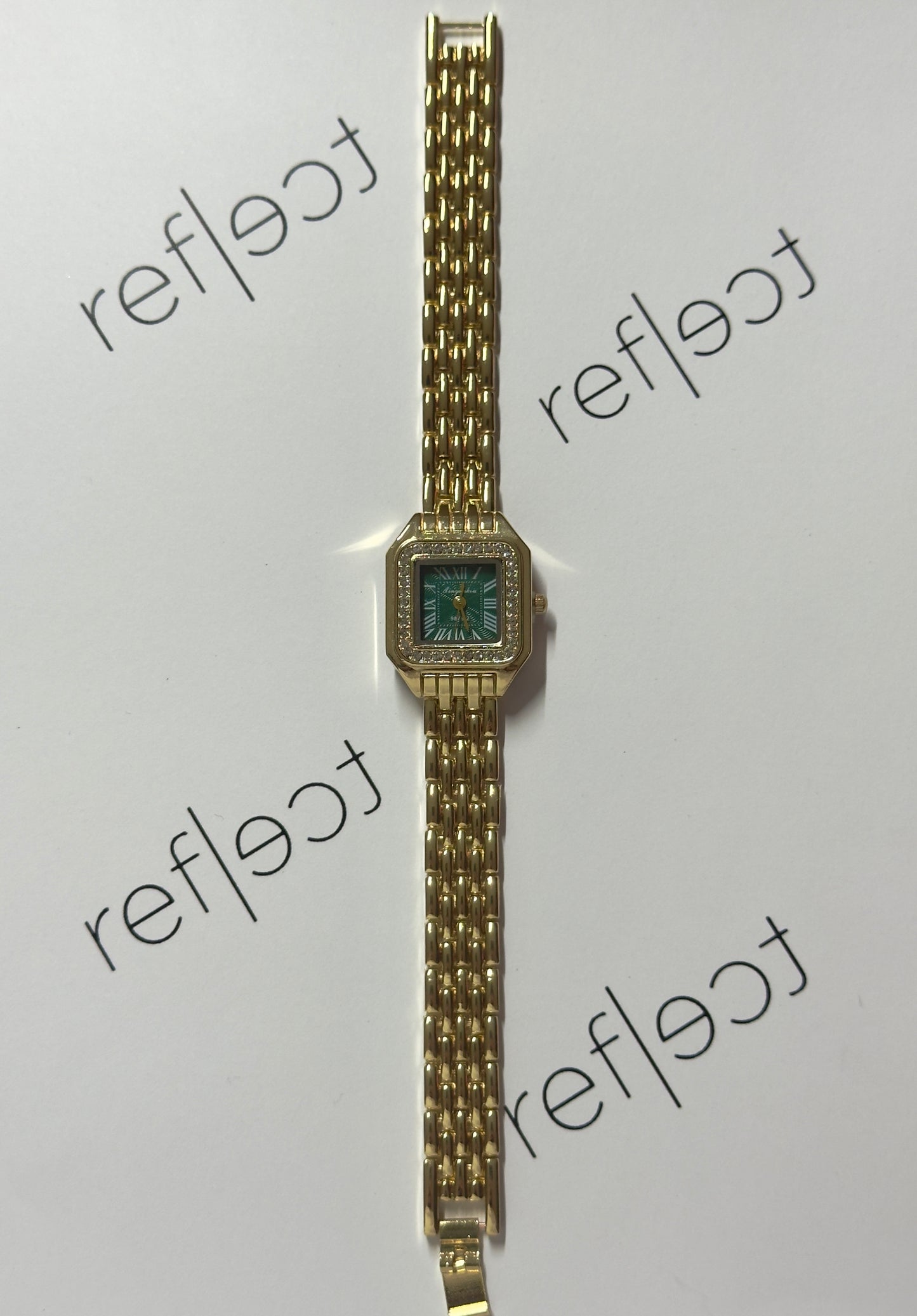 Bella gold-emerald
