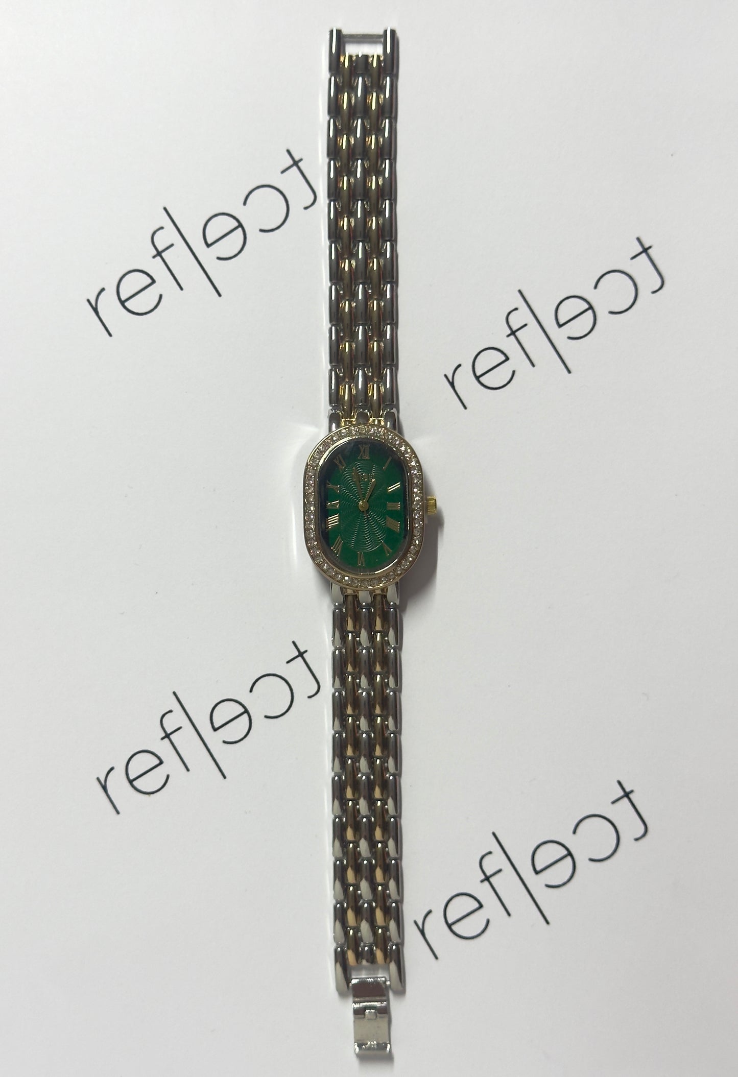 Oval mixed-emerald
